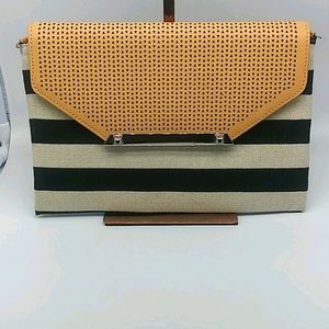Stella & Dot tan and black and white wristlet